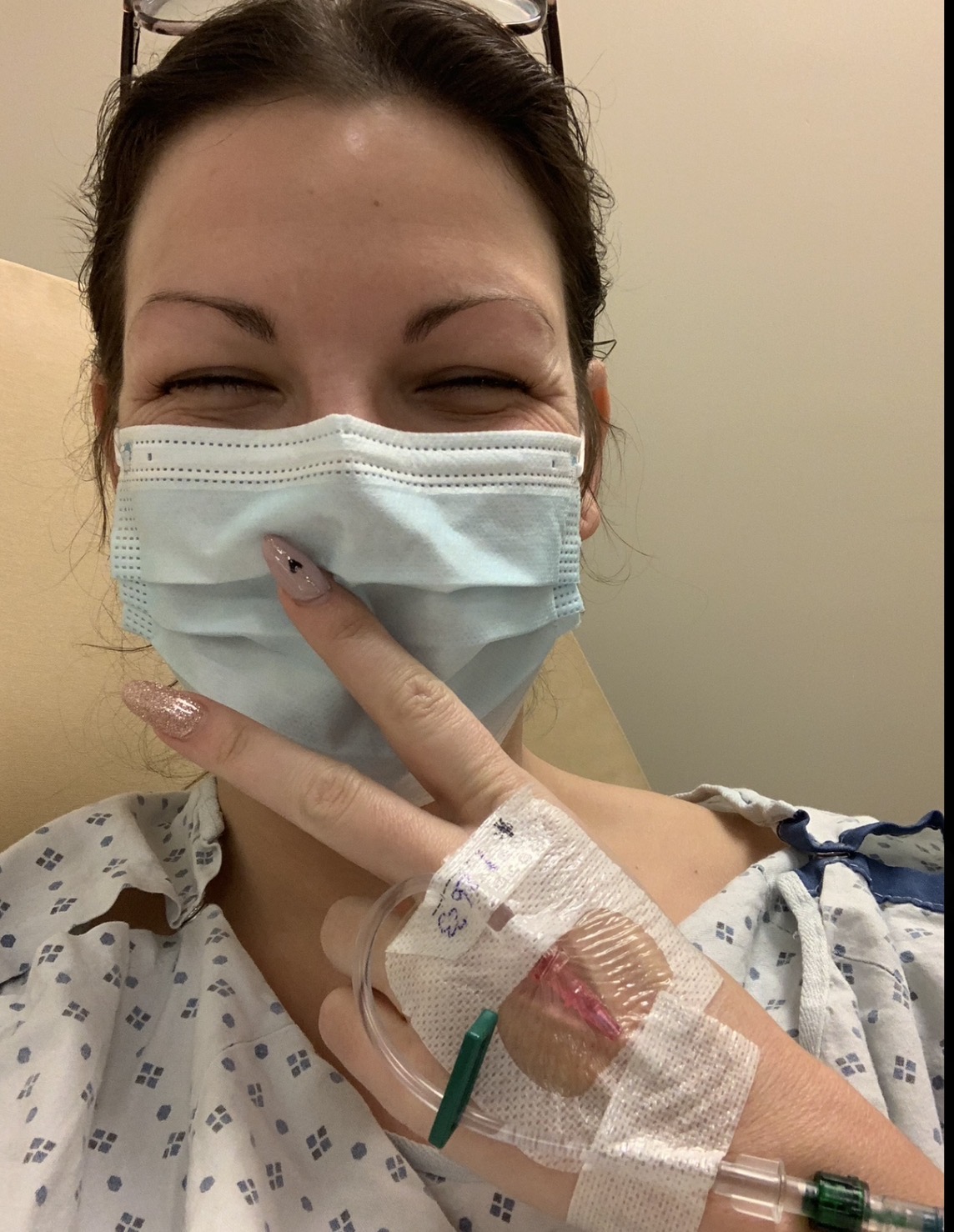 Sarah at the hospital smiling